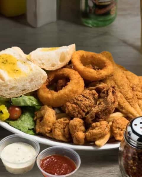 Seafood Platter—classic Louisiana flavors, served with a side of history. 

#Seafood #BatonRougeTradition