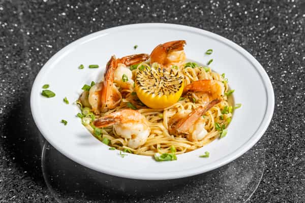 Shrimp scampi pasta with tomatoes, herbs, and Parmesan at Gorat's Steak House