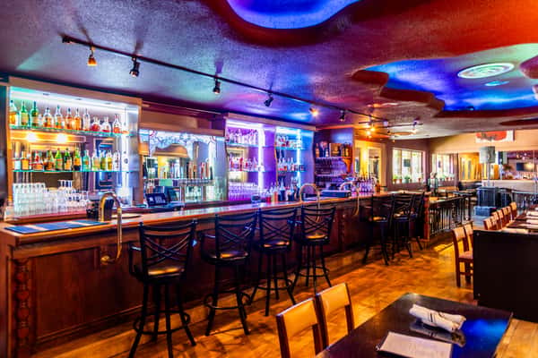Classic bar with colorful evening lighting at Gorat's Steak House in Omaha, Nebraska