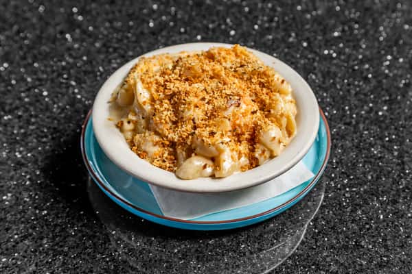 Truffle lobster mac and cheese with creamy sauce and toasted breadcrumb topping at Gorat's Steak House