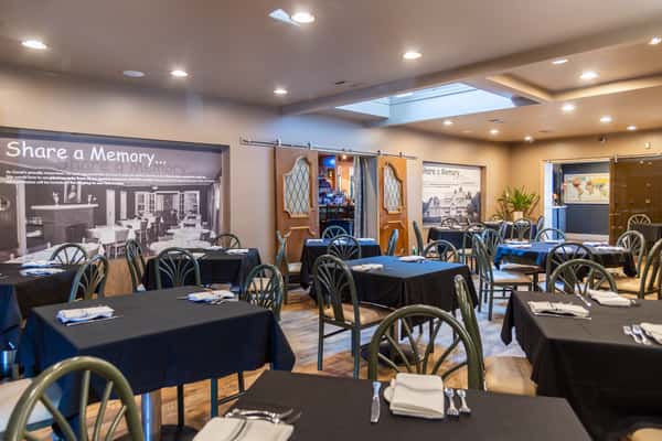 Traditional dining room with historic wall displays at Gorat's Steak House in Omaha