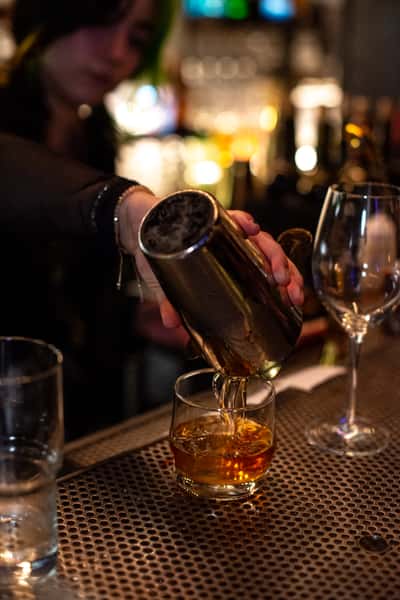 pouring whiskey