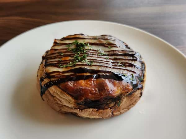 portobello mushroom, stewed tomatoes, onions, italian green squash, yellow squash, eggplant, yellow and red sweet peppers, provolone cheese, balsamic glaze