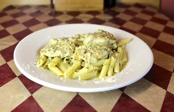 penne with chicken on top