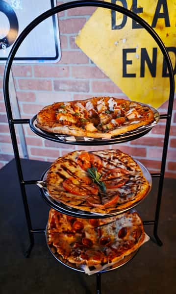 a flight of 8in grilled pizzas
choose any three!