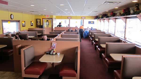 interior dining area with booths and chairs