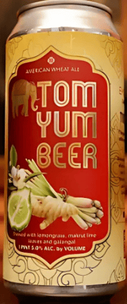Tom Yum Beer can with red and gold label, illustrated lemongrass, lime, and galangal, highlighting Thai-inspired wheat ale branding