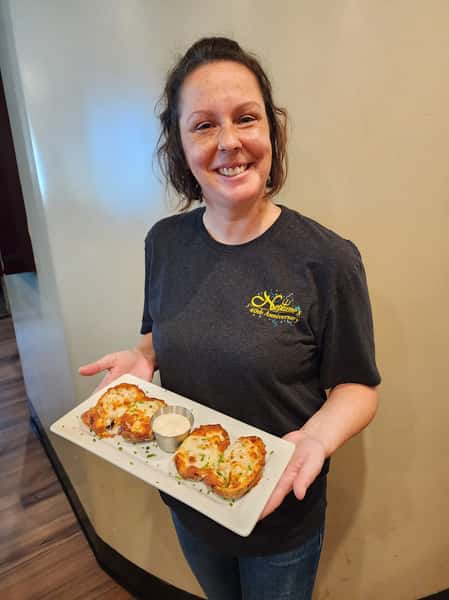 Seafood Skins (Shrimp, Scallops & Crab)
w/ cooper cheese, pepperjack & chives served w/ a creamy Dijon & horseradish sauce