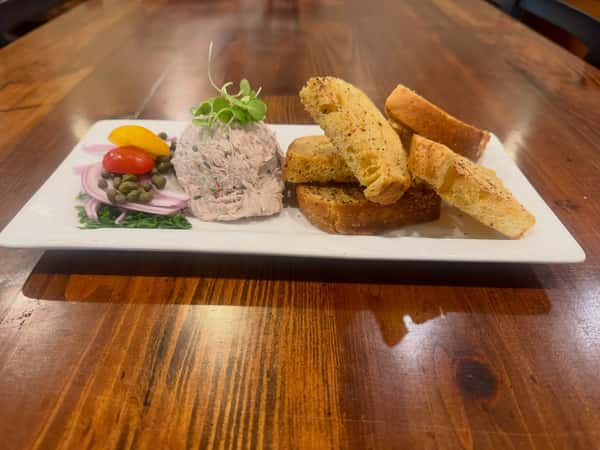 Smoked Bluefish Pate
Laced w/ sherry & chives, served w/ red onion, caper & parsley salad & sourdough crostini