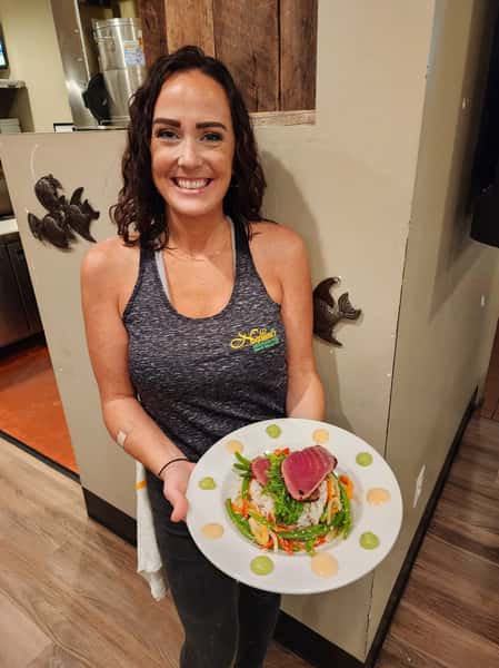 Seared Ahi Tuna (Rare) w/ Sweet & Spicy Rub Served over nori & ginger seasoned sushi rice w/ quick pickled Asian style veggies, seaweed salad & wasabi - avocado puree