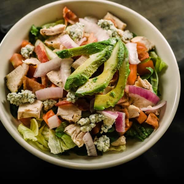 Fresh mixed meat bowl with sliced meat and vegetables