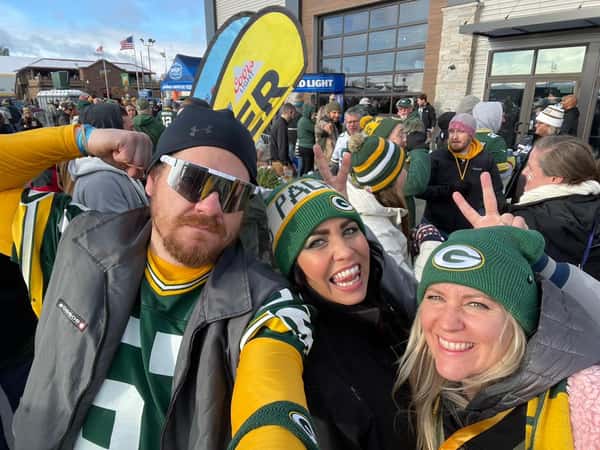 Green Bay packers fans using Heard Hospitality shuttle bus for Packers games