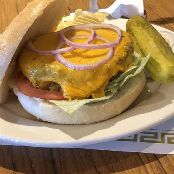 Veggie Burger with cheese, onions, and pickles