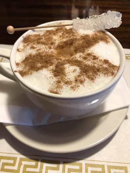 latte with rock candy on top