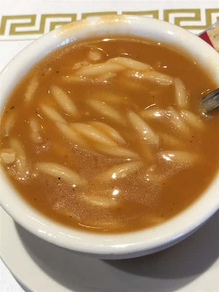 a bowl of tomato orzo soup