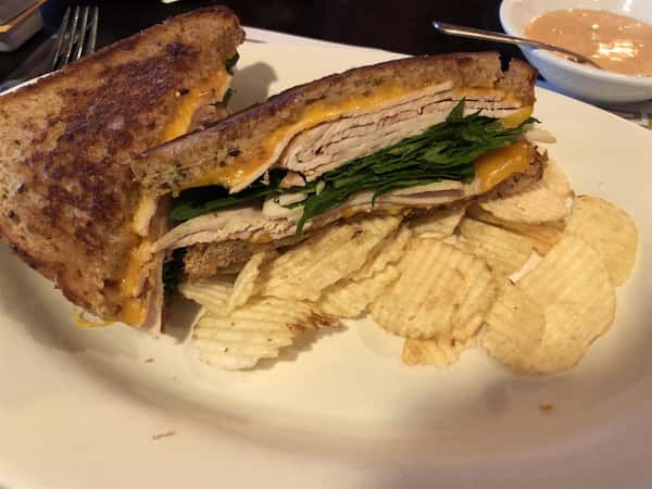 turkey, spinach and cheese melt, with a side of chips