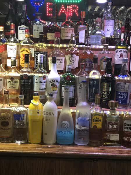 bar with various alcoholic drinks