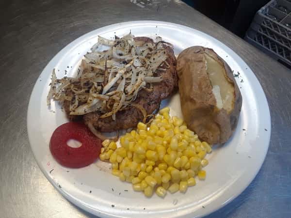 Black Angus Chopped Steak with Grilled Onions & Mushrooms and a side of corn adn a baked potato