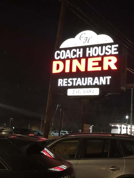 large lit Coach House Diner sign