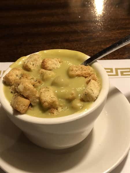split pea with croutons in a bowl
