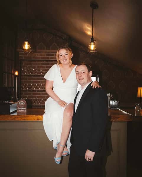 bridge and groom on bar