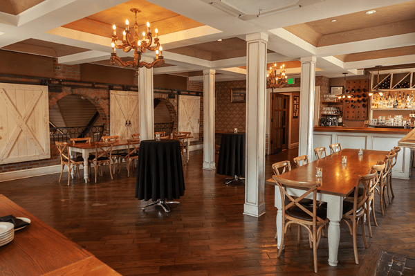 Farm room set up for half seated half cocktail style