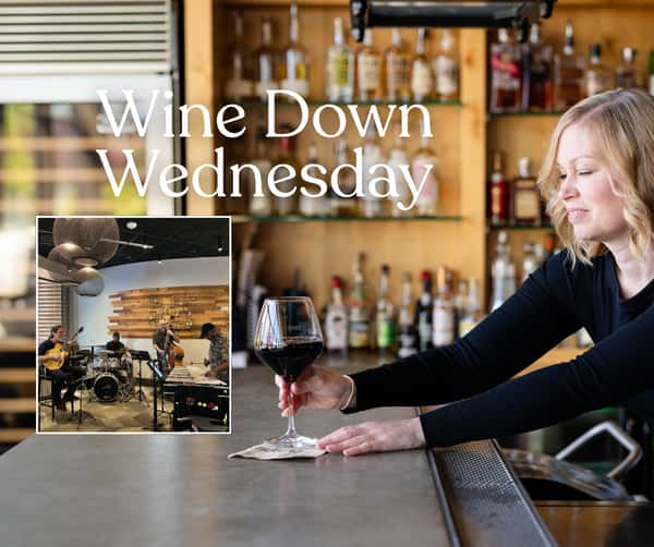 Bartender pouring wine