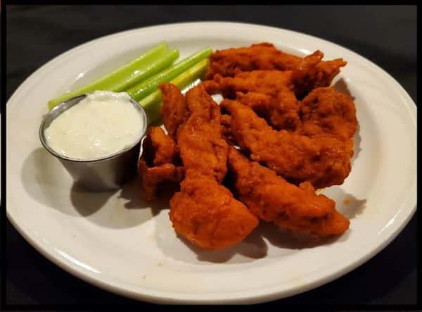 The second image shows a plate of crispy buffalo chicken tenders served with celery sticks and a side of creamy dipping sauce, perfect for a classic pub-style appetizer.