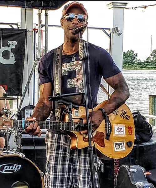 Frankie P at Mic with Guiter 