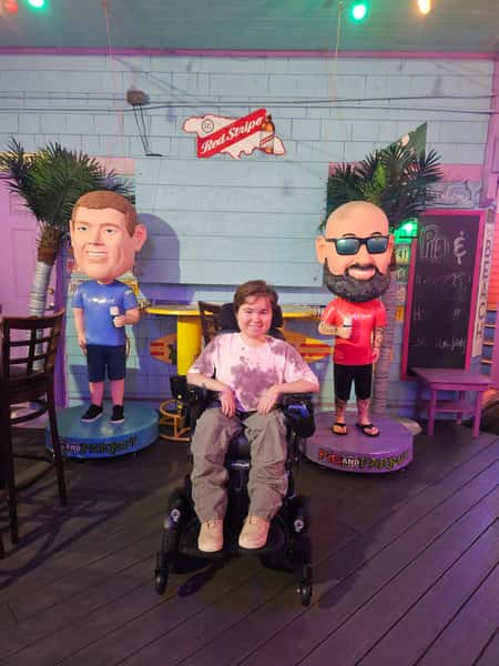 Young boy with 2 bobbleheads