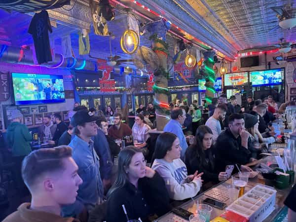 Busy bar people playing bingo