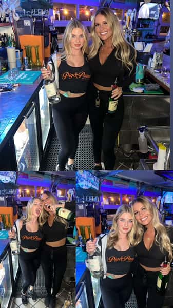 Bartenders holding bottles