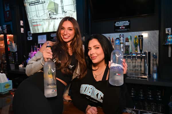 two women with drinks