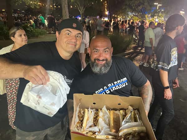 Mike with bouncer and sandwiches