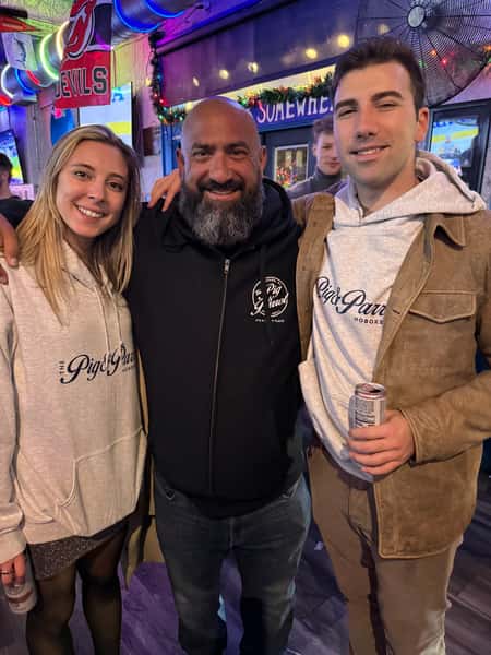 Mike with customers wearing Pig and Parrot Sweatshirts