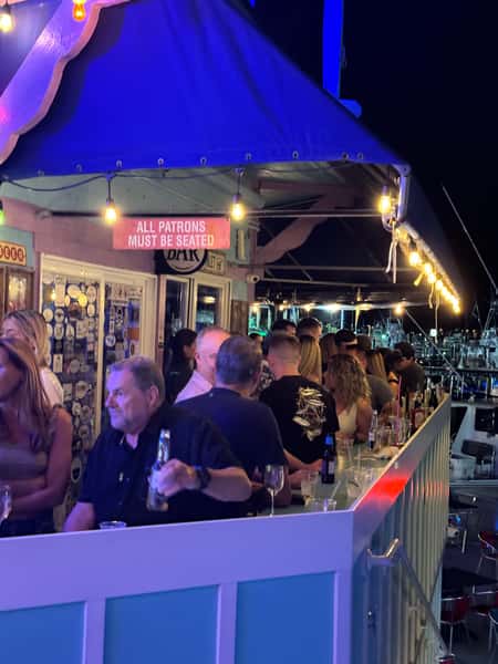 Guests on patio bar