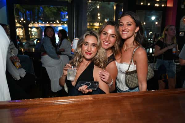 three ladies at the bar