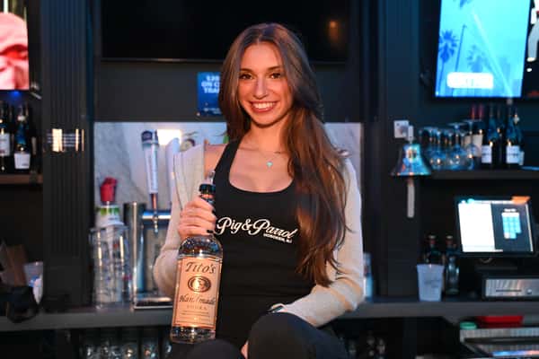 Bartender Titos bottle