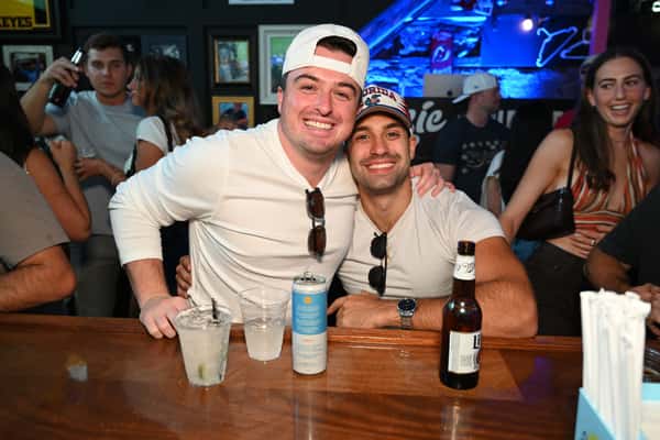 two guys posing