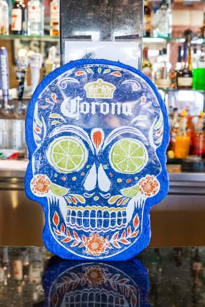 Restaurant decor - a blue traditional mexican skull from Corona beer