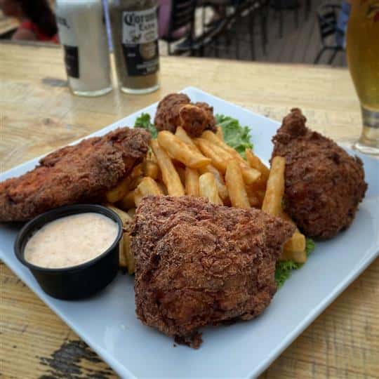 honey fried chicken, fries and dipping sauce