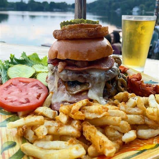 burger with fries and glass of beer