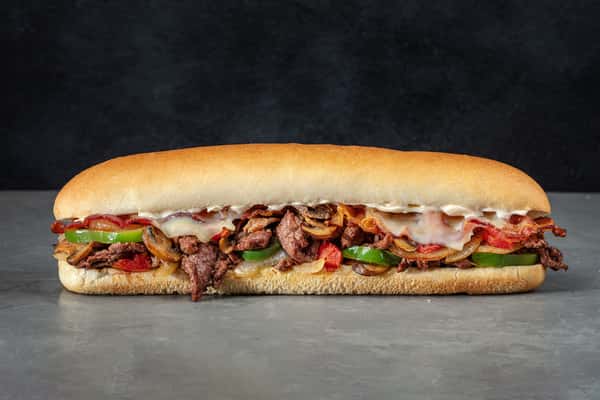 love local. eat delicious. the steak bomb - a big mouth full of flavor