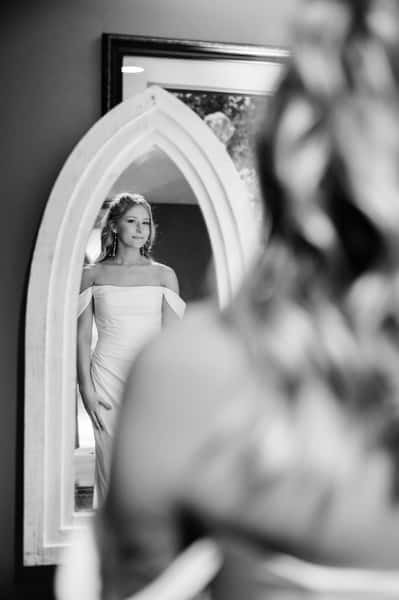 Bride looking in the mirror