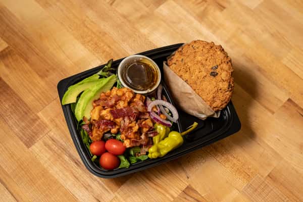 salad box with salad and a cookie