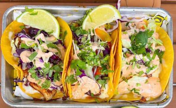 tacos with veggies and dressing