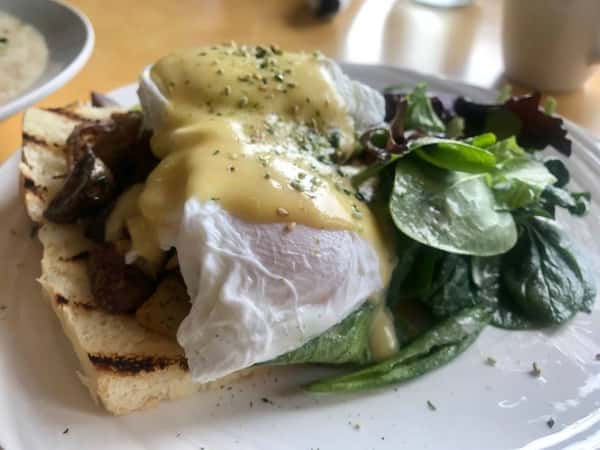 eggs benedict with side salad