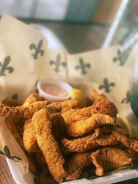 hand battered chicken tenders with french fries