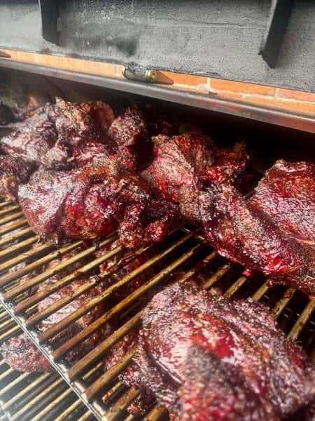 Grilling meat on grill