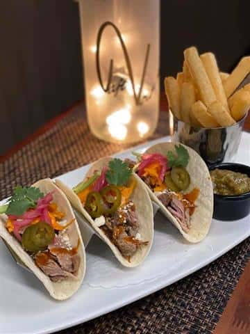 Slow Cooked Pork Carnitas served with Fresh Cut Yuca Fries